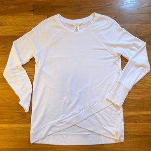 White shirt with crisscross accent in the front